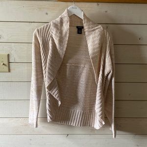 Cream sweater with tan detailing throughout shirt